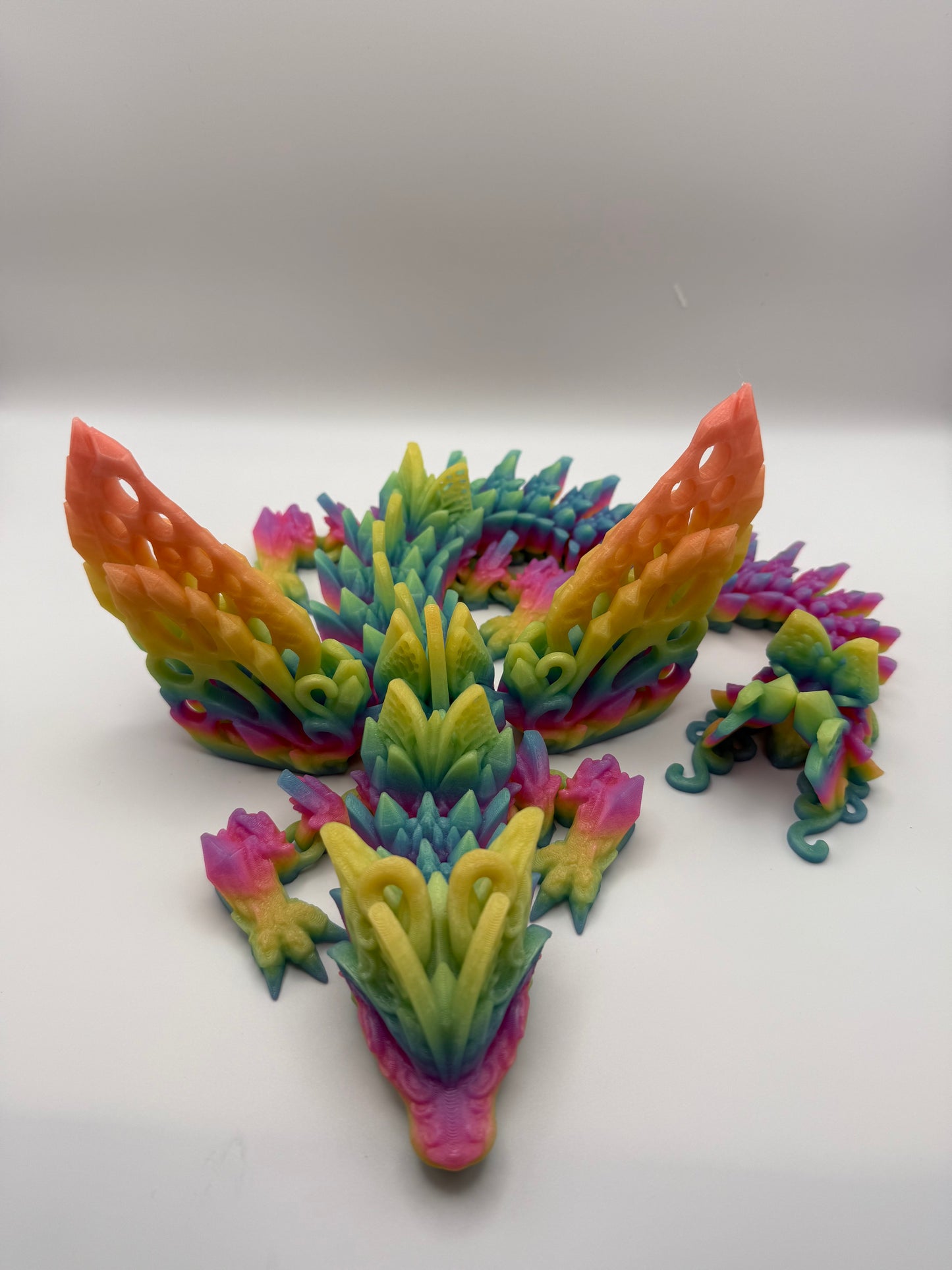 "Fae Wolf Dragon" – 3D Printed Articulated Figurine in Rainbow Glow-in-the-Dark Filament